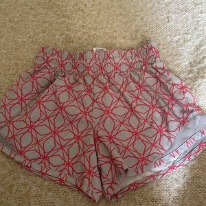 Large workout shorts. Grey and red girls size 10-12